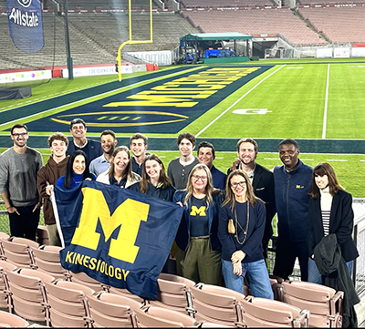 alumni and friends at a bowl game