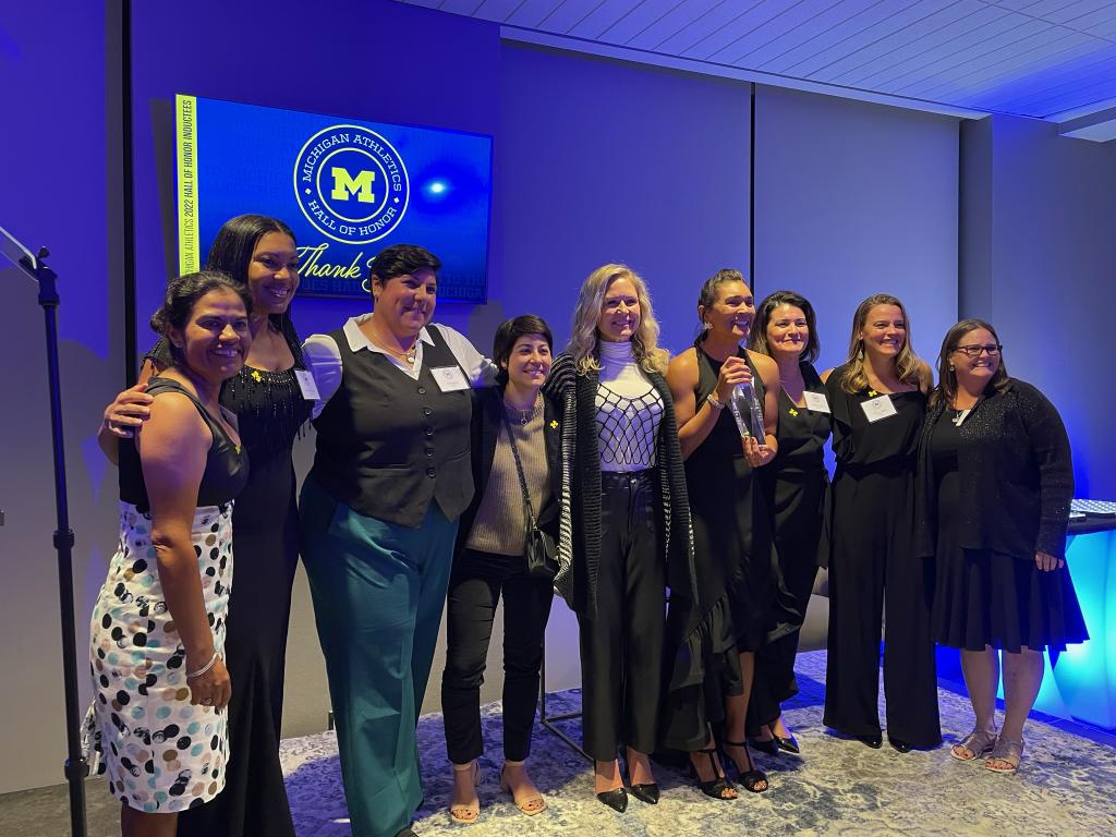 Abby Minihan with some of her former U-M teammates at her Hall of Honor induction ceremony