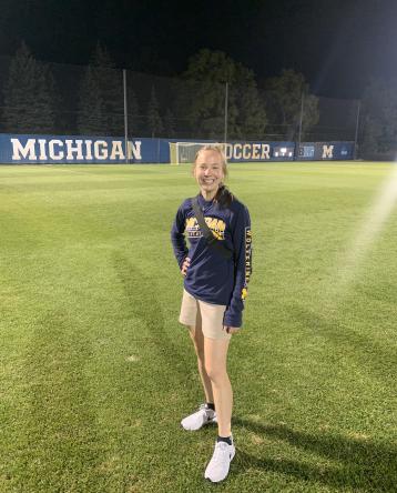 Sarah Miller standing on a soccer field