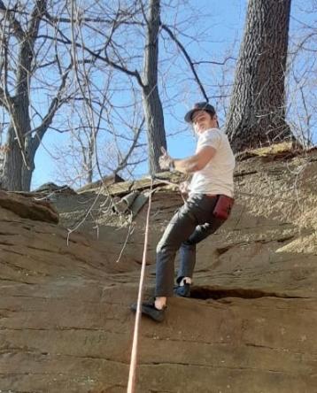 Dayne Hopkins rock climbing