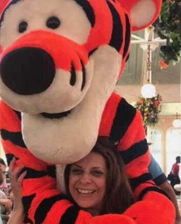 Susan Rinaldi with Tigger at Disney World