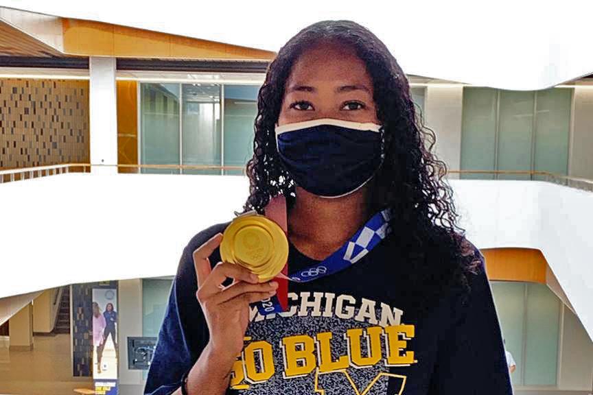 Jayde Riviere holds her gold medal