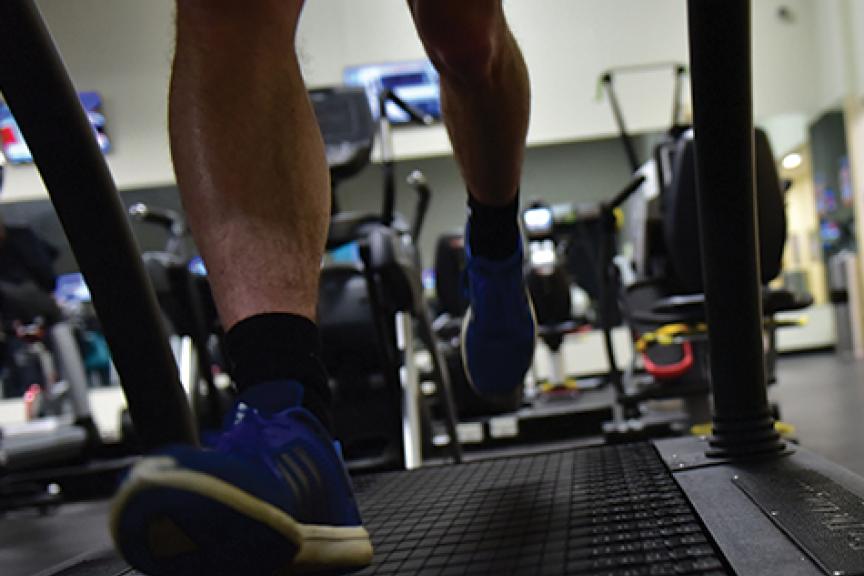 Feet jogging on treadmill