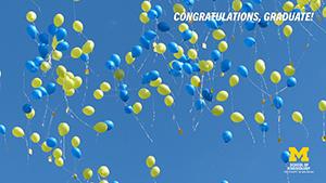 Congratulations Graduate! with maize and blue balloons