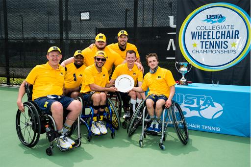 U-M Wheelchair Tennis team holding trophy