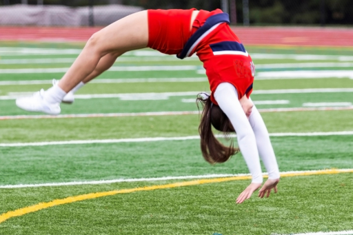 Cheerleader doing a back handspring