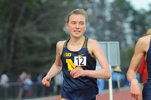 Kayla Keane running on a track